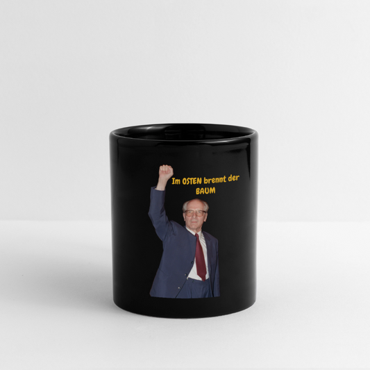 OSSI16Kaffeetasse Im OSTEN brennt der BAUM - Schwarz